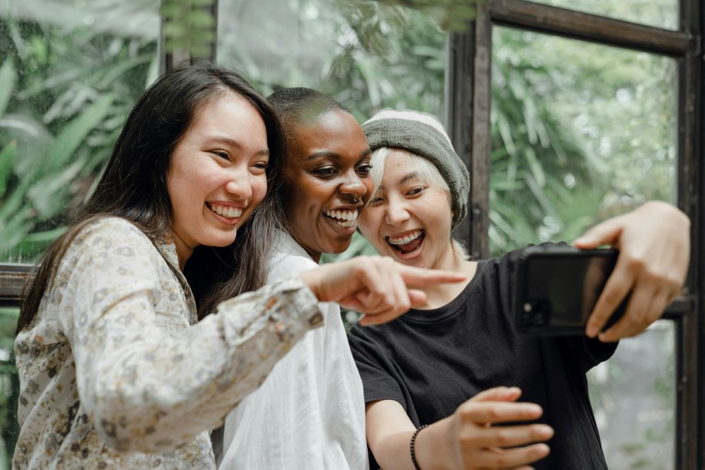 group looking at phone