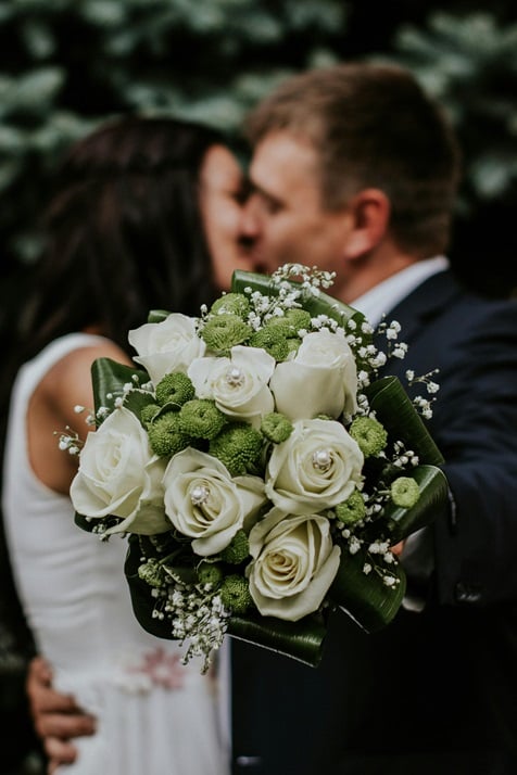 Wedding couple and bouquet